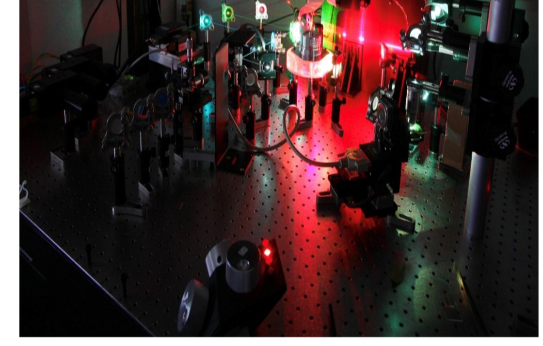 Custom-built laser-scanning confocal microscope that combines a polygonal scanner and galvanometric scanner to achieve video-rate imaging.
